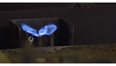 The blue flame of a pilot light