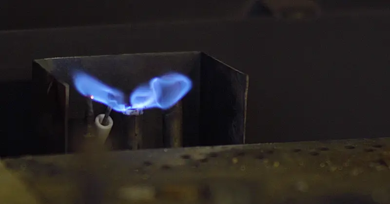 The blue flame of a pilot light